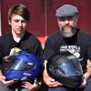 父亲和儿子拿着Shoei GT Air和GT Air II头盔。