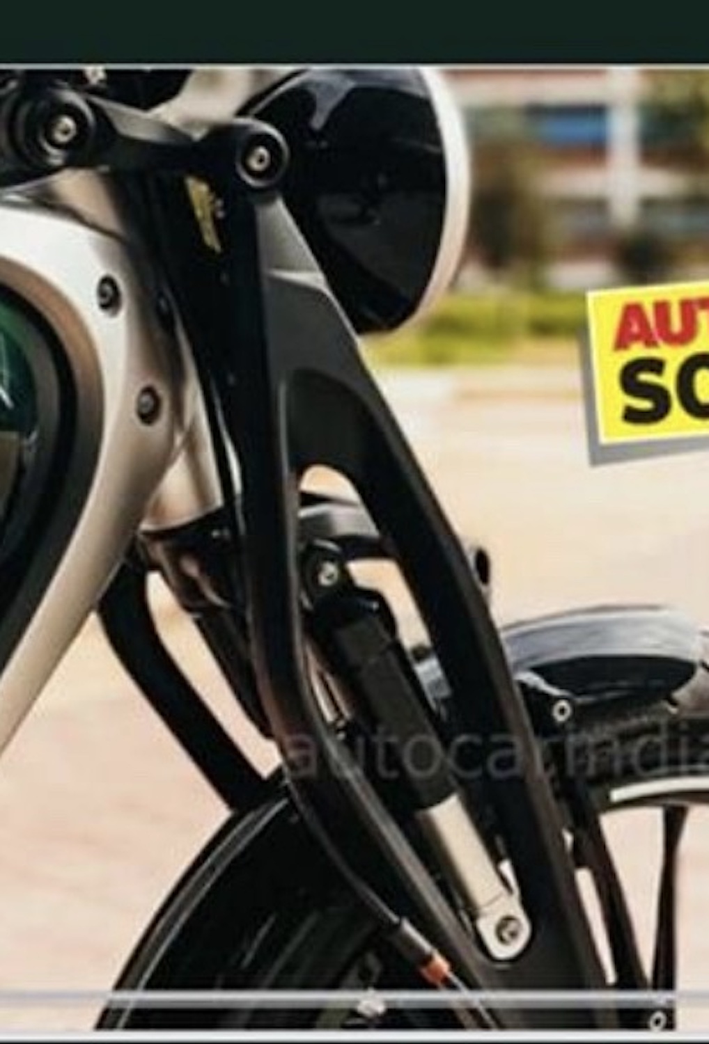 由AutoCarIndia泄露的皇家恩菲尔德的新电动摩托车概念的悬挂职责的近距离视图。媒体来源:Twitter。